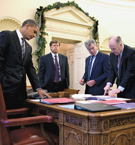 President Barack Obama with (from left) Michael McFaul, National Security Council senior director for Russian affairs; Samore, special assistant to the president; and Tom Donilon, deputy national security adviser, in the Oval Office in November 2009.